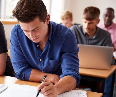 Canva—Mature-Male-Student-Attending-Adult-Education-Class-1